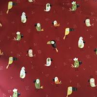 Toucans colorés sur fond rouge